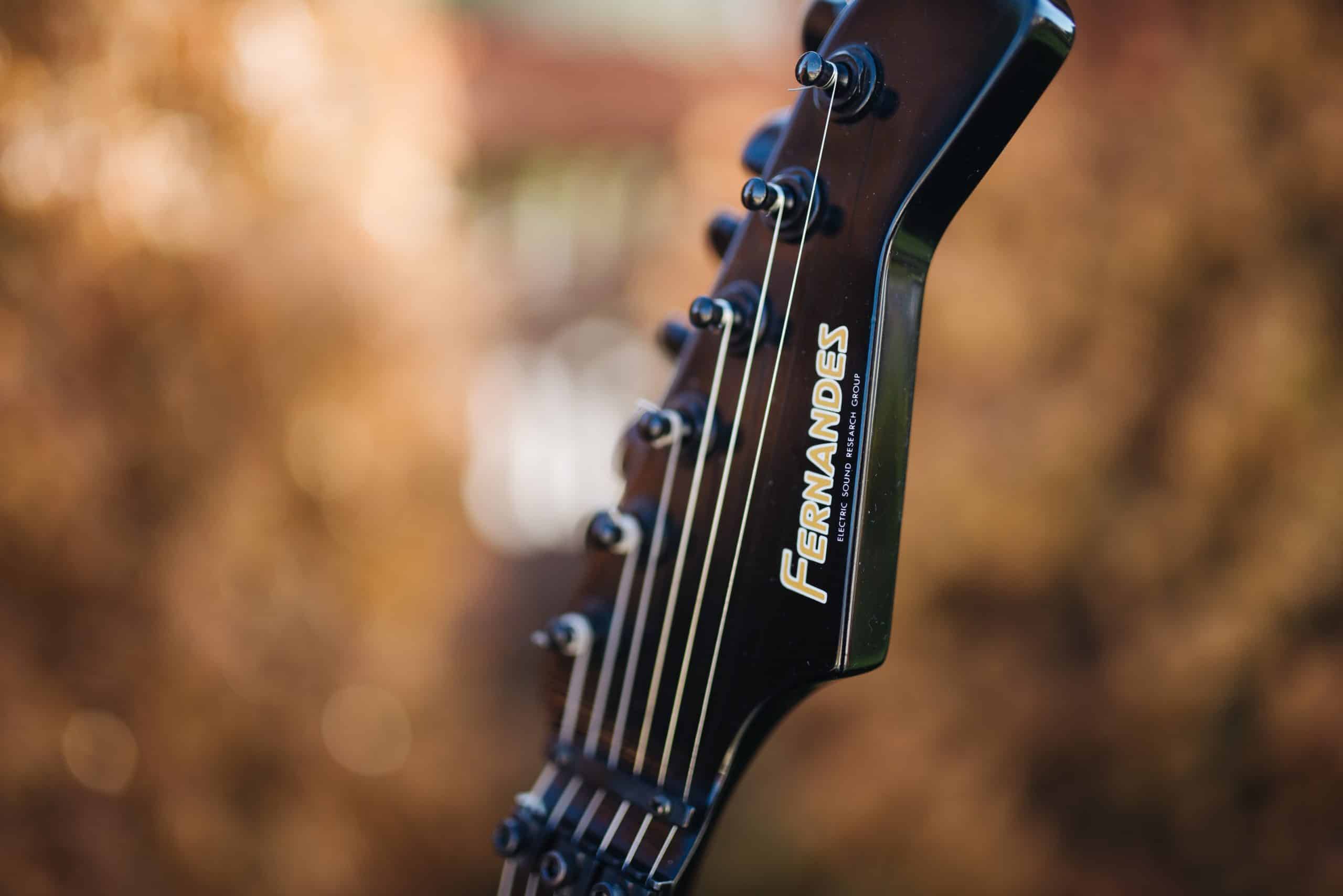Fernandes_FR-55_(c.1986)_by_Matsumoku_-_headstock_logo_with_locking_nut_(2022-10-17_15.30.36_by_Nenad_Stojkovic) Fernandes_FR-55_(c.1986)_by_Matsumoku_-_headstock_logo_with_locking_nut_(2022-10-17_15.30.36_by_Nenad_Stojkovic)